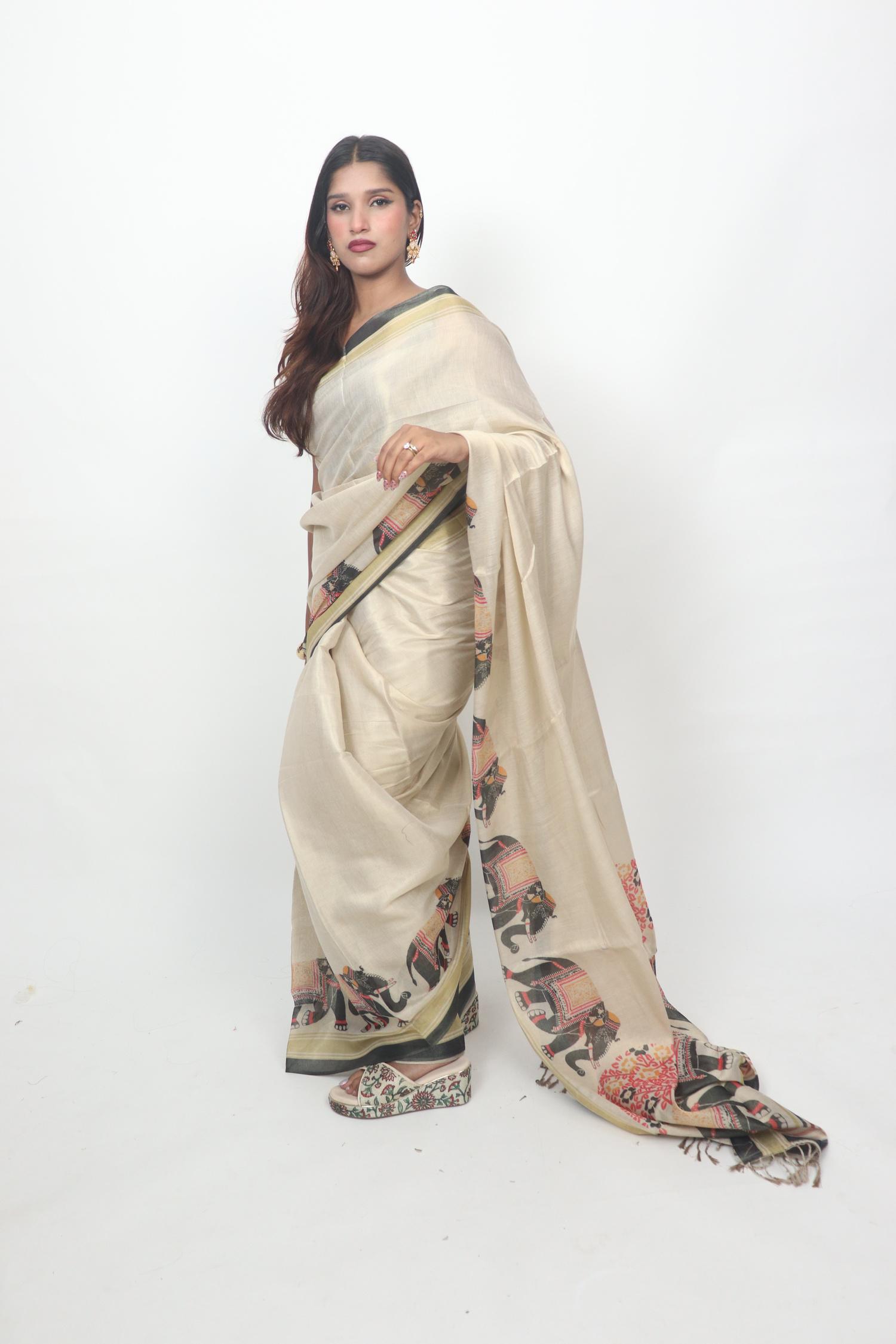 Ivory Elephant Border Saree