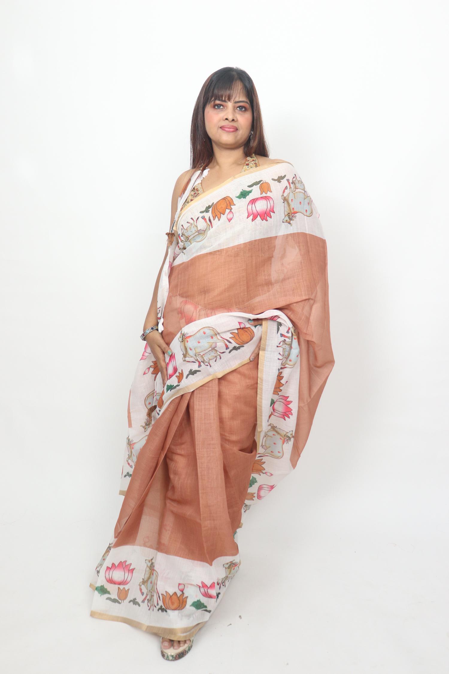 Terracotta Lotus Cow Border Saree